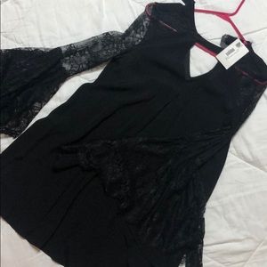 Flowy black sleeved dress